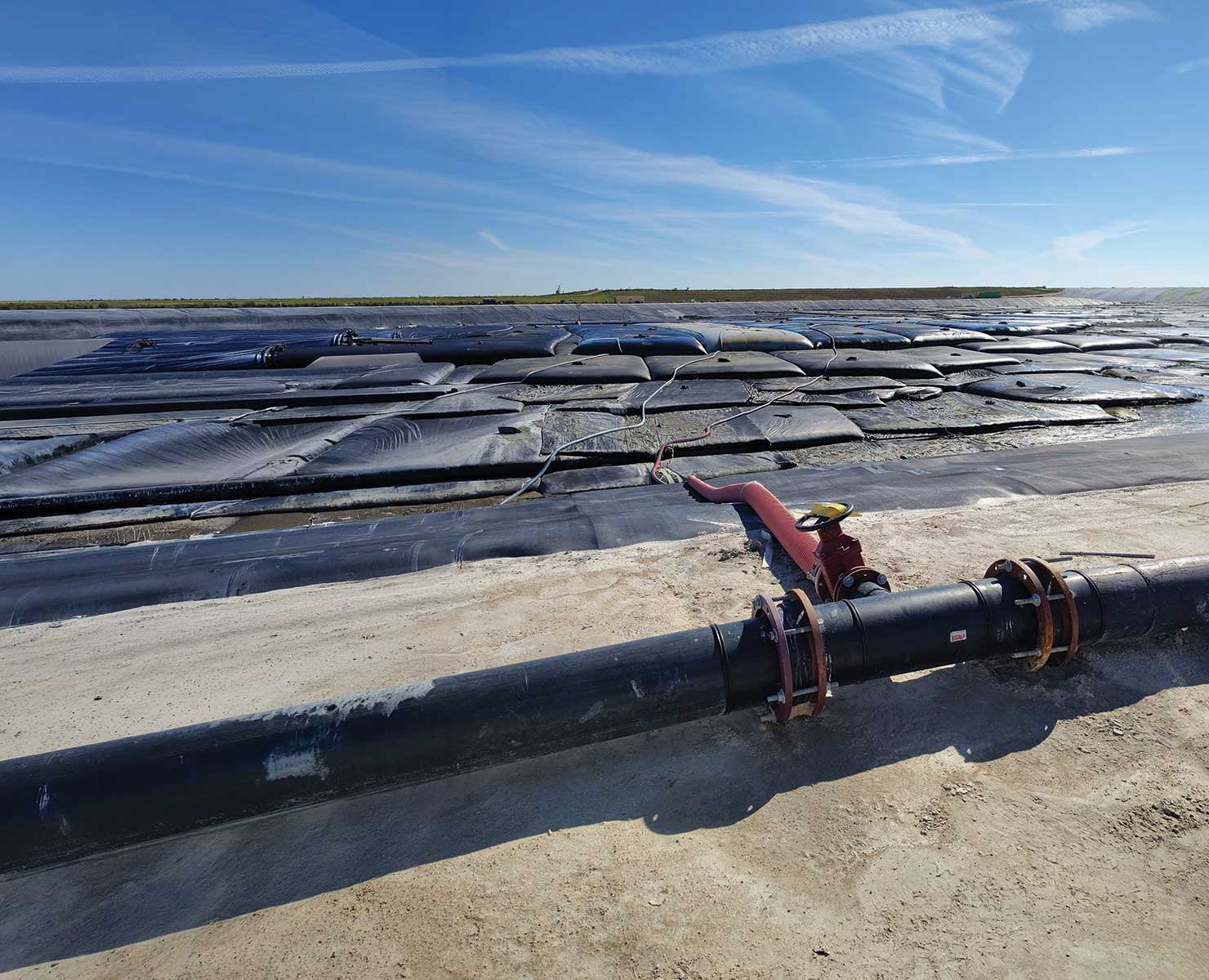 PINEY-POINT Dredging equipment staged along the Piney Point shoreline