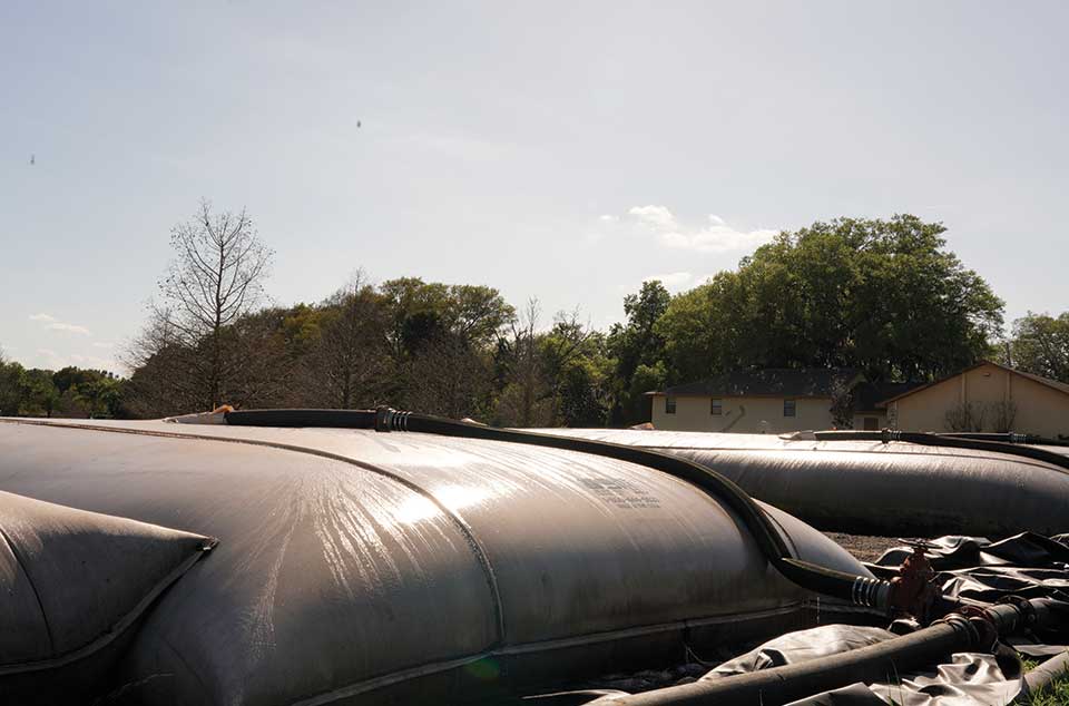 Geotextile tubes filled with dredged material at Lake Lorraine