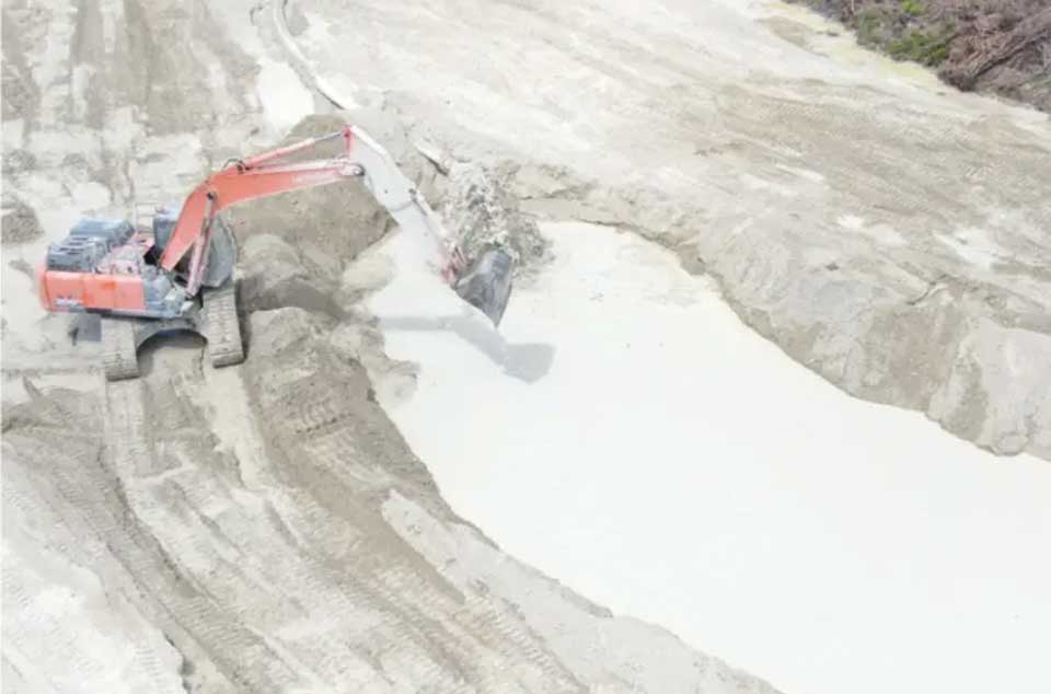 Discharge pit and pump line routing across the Skysail development